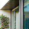 Cleaner washing exterior house windows